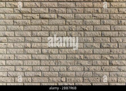 Wall and wall paneling with grouted bright clinker bricks Stock Photo