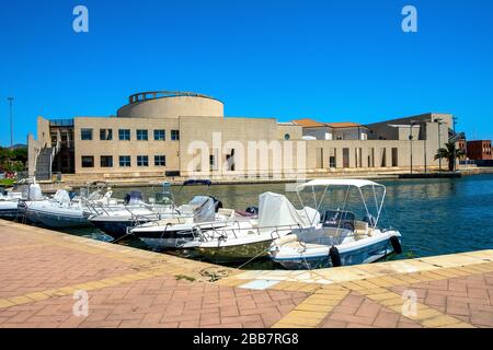 Olbia, Sardinia / Italy - 2019/07/21: Panoramic view of the Archeological Museum of Olbia - Museo Archeologico - on Gulf of Olbia island at the port Stock Photo