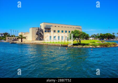 Olbia, Sardinia / Italy - 2019/07/21: Panoramic view of the Archeological Museum of Olbia - Museo Archeologico - on Gulf of Olbia island at the port Stock Photo