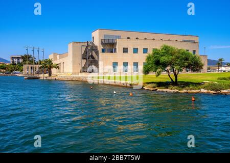 Olbia, Sardinia / Italy - 2019/07/21: Panoramic view of the Archeological Museum of Olbia - Museo Archeologico - on Gulf of Olbia island at the port Stock Photo