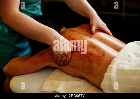 scrub body massage pampering close up Stock Photo