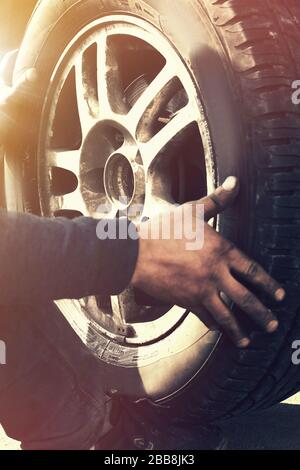 Close up view on wheel repair vertical Stock Photo