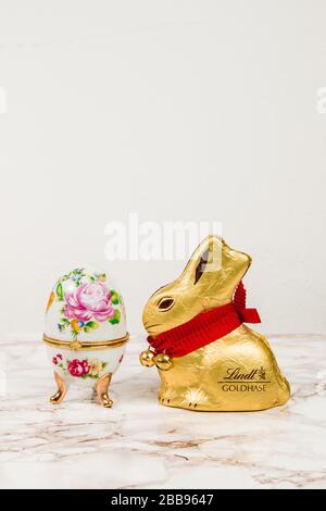 Luxury Easter egg with decorations on a marble background Stock Photo