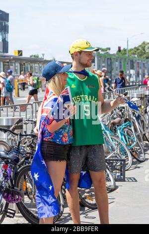 Young couple celebrating Australia Day, Swanston Street, City Central, Melbourne, Victoria, Australia Stock Photo