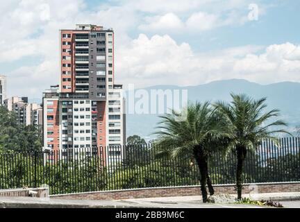 MEDELLIN, COLOMBIA - MAY 31, 2018: View of an apartment building with mountains in the background. Stock Photo
