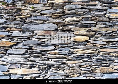 View of the stone wall texture - Ligurian typology Stock Photo