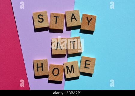 Stay At Home, words on colorful background Stock Photo