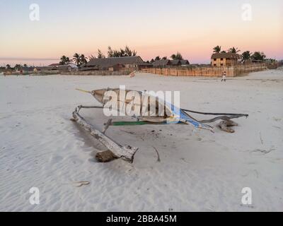 Fishing boat on the sandy beach sunset Morondava Stock Photo