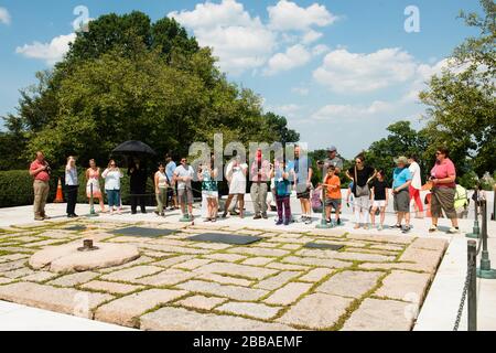 'A group of educators visit the gravesite of Pres. John F. Kennedy in Arlington National Cemetery during the Friends of the World War II Memorial Teachers Network and Conference, July 21, 2016, in Arlington, Va. Some of the points of interest on the tour were the Tomb of the Unknown Soldier and Pres. John F. Kennedy’s gravesite. (U.S. Army photo by Rachel Larue/Arlington National Cemetery/released); 21 July 2016, 15:02; Educators tour Arlington National Cemetery during the Friends of the World War II Memorial Teachers Network and Conference; Arlington National Cemetery; '