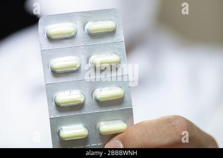 Concept consisting of pills. The photo was photographed in the studio. Stock Photo