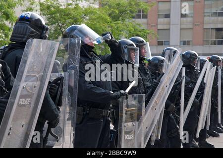 Riot Police taking a break at Toronto Police Station (52 Division) on June 25, 2010, in Toronto, Canada. Stock Photo