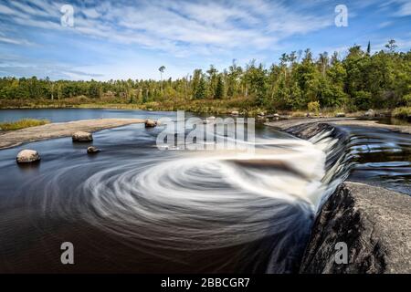 Swirling water at Rainbow Falls, Whiteshell Provincial Park, Manitoba, Canada Stock Photo