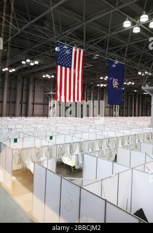 New York, USA. 30th Mar, 2020. Medical area of the temporary hospital is seen at Jacob K. Javits Center in New York, the United States, March 30, 2020. Monday marked the opening of the first 1,000 temporary beds in the field hospitals assembled by the Army in the Jacob K. Javits Center in Manhattan. (Guang Yu/Handout via Xinhua) Credit: Xinhua/Alamy Live News Stock Photo