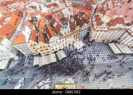 PRAGUE, CZECH REPUBLIC - 21ST OCT 2016: Views of Prague skyline from the Old Town Hall tower showing the outside of buildings, rooftops and people. Stock Photo