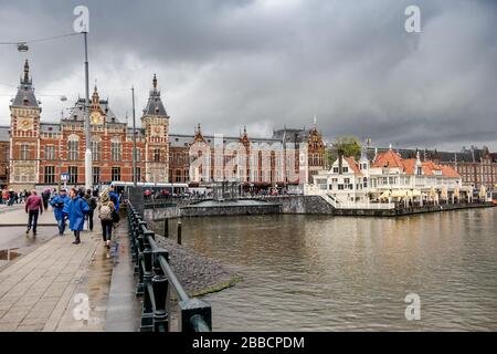 Amsterdam Centraal Station, the Central Railway Station in Amsterdam, The Netherlands Stock Photo