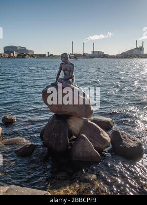 The famous Little Mermaid statue, at Langelinie quay in the harbour of Copenhagen Denmark