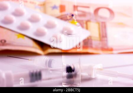 Double exposure image of euro banknotes and medicines. Seasonal flu vaccine. Health insurance concepts. Stock Photo