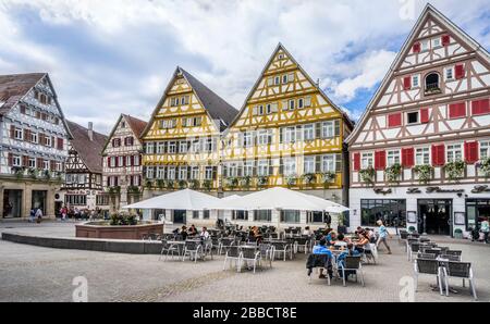 market square (Marktplatz) with 17th century timber framed houses and open air restaurants in the old town of Herrenberg, Baden Württemberg, Germany Stock Photo