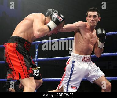 Nigel Wright (shite shorts) defeats Ross Minter (red/black) shorts, Prizefighter 'The Welterweights' boxing at York Hall, Bethnal Green, promoted by M Stock Photo