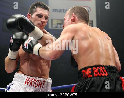 Nigel Wright (shite shorts) defeats Ross Minter (red/black) shorts, Prizefighter 'The Welterweights' boxing at York Hall, Bethnal Green, promoted by M Stock Photo