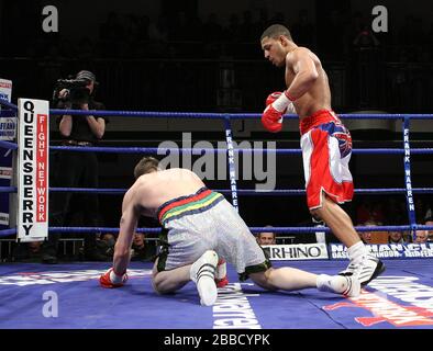 Kell Brook (Sheffield, white/red shorts) defeats Stuart Elwell (Walsall)  in a Welterweight boxing contest for the British Title at York Hall, Bethnal Stock Photo