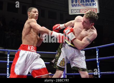 Kell Brook (Sheffield, white/red shorts) defeats Stuart Elwell (Walsall)  in a Welterweight boxing contest for the British Title at York Hall, Bethnal Stock Photo