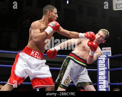 Kell Brook (Sheffield, white/red shorts) defeats Stuart Elwell (Walsall)  in a Welterweight boxing contest for the British Title at York Hall, Bethnal Stock Photo