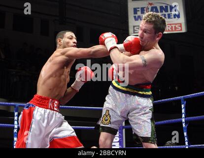 Kell Brook (Sheffield, white/red shorts) defeats Stuart Elwell (Walsall)  in a Welterweight boxing contest for the British Title at York Hall, Bethnal Stock Photo