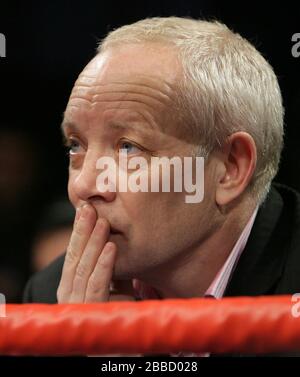 Promoter Frank Maloney watches his boxers at Newham Leisure Centre Stock Photo