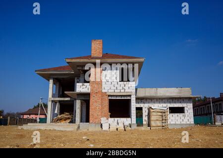 construction of a country two-story house from a gas block Stock Photo