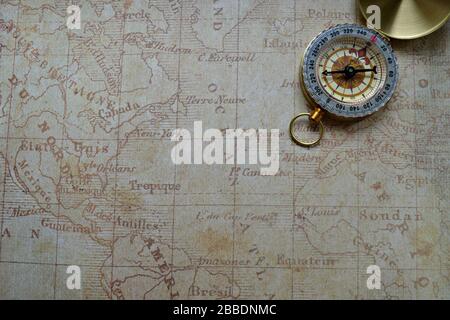 Old Compass on the map background Stock Photo