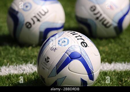 Peterborough United mitre match balls on the pitch Stock Photo