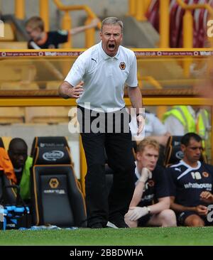 Wolverhampton Wanderers' Manager Kenny Jackett urges his team on during the game against Real Betis'. Stock Photo