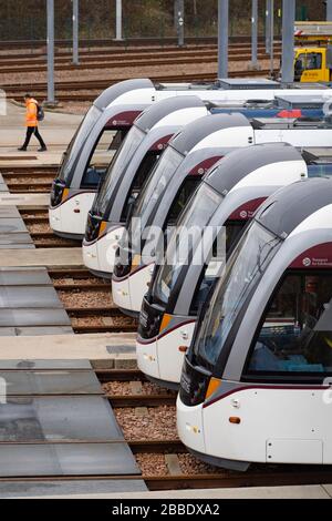 Edinburgh, Scotland, UK. 31 March, 2020. Trams lie idle in depot at Gogar in Edinburgh. Edinburgh Trams are running a reduced service during the coronavirus / Covid-19 pandemic and public lockdown. Credit: Iain Masterton/Alamy Live News Stock Photo