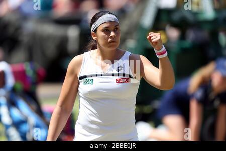 France's Marion Bartoli celebrates during her match against Germany's Sabine Lisicki Stock Photo