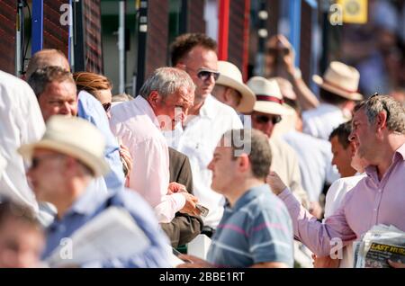Racegoers during the Coral-Eclipse Day at Sandown Racecourse Stock Photo