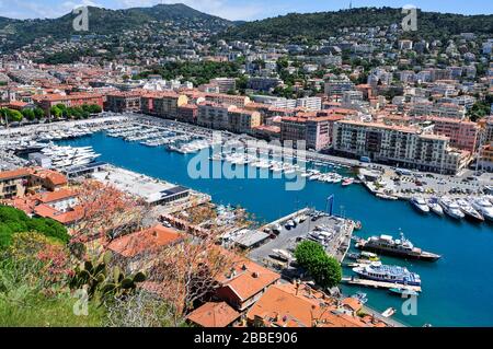 NICE, FRANCE - MAY 16: Aerial view of the port of Nice, also known as Lympia Port on May 16, 2015 in Nice, France. From this port, there are ferry con