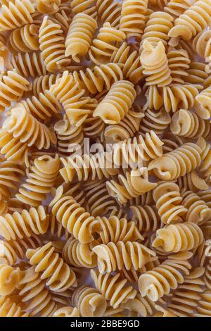 Close up of uncooked dry fusilloni pasta Stock Photo