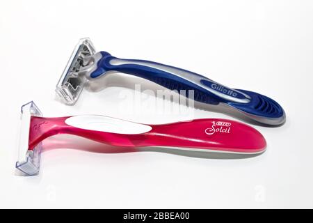 His & Her Disposable Razors on a white background Stock Photo