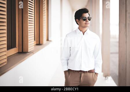 Cool young man posing for the camera Stock Photo