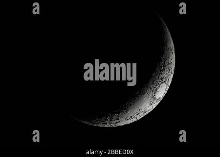 Half Moon Background / The Moon is an astronomical body that orbits planet Earth, being Earth's only permanent natural satellite Stock Photo