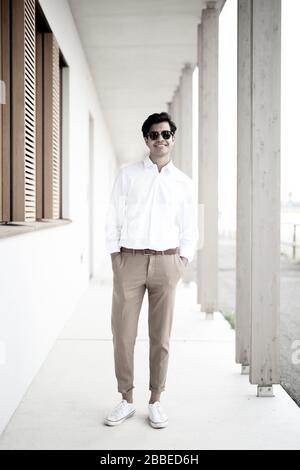 Cool young man posing for the camera Stock Photo