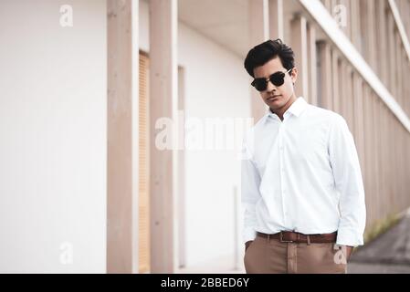 Cool young man posing for the camera Stock Photo