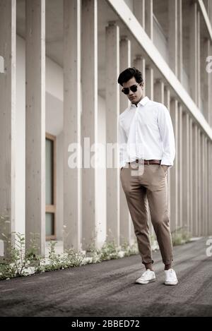 Cool young man posing for the camera Stock Photo