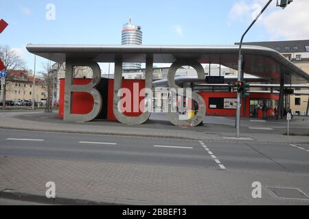 Jena, Germany. 31st Mar, 2020. The bus station in the centre of the city. In a week's time, the wearing of a mouth and nose protector will become obligatory in Jena's sales outlets, public transport and buildings with public traffic, the city announced. Credit: Bodo Schackow/dpa-Zentralbild/dpa/Alamy Live News Stock Photo