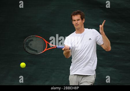 Great Britain's Andy Murray trains on the practice courts