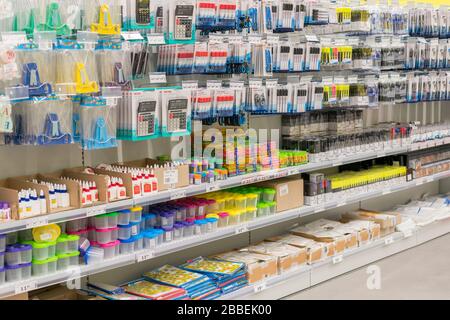 Kiev, Ukraine. July 19 2019 stationery store, glue, pens, felt-tip pens, calculators on a shelf in the store. Stock Photo