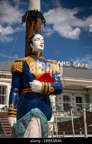 South Africa, Western Cape, Cape Town, Victoria and Alfred Waterfront, signpost, ship’s figurehead outside Grand Cafe Stock Photo