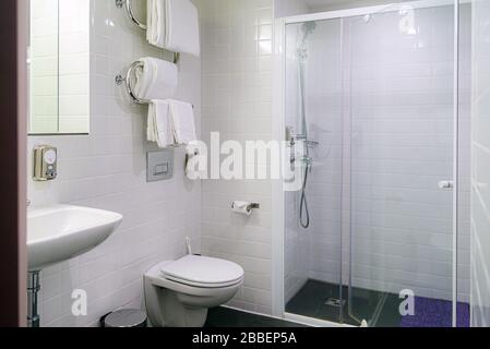 Beautiful interior in white color of bathroom in a modern house. Stock Photo