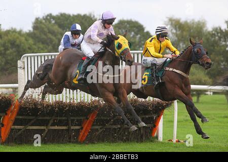 Nebula Storm ridden by Joshua Moore (R) and Giant Hercules ridden by Jack Sherwood in jumping action during the Pudding Norton Conditional Jockeys Sel Stock Photo